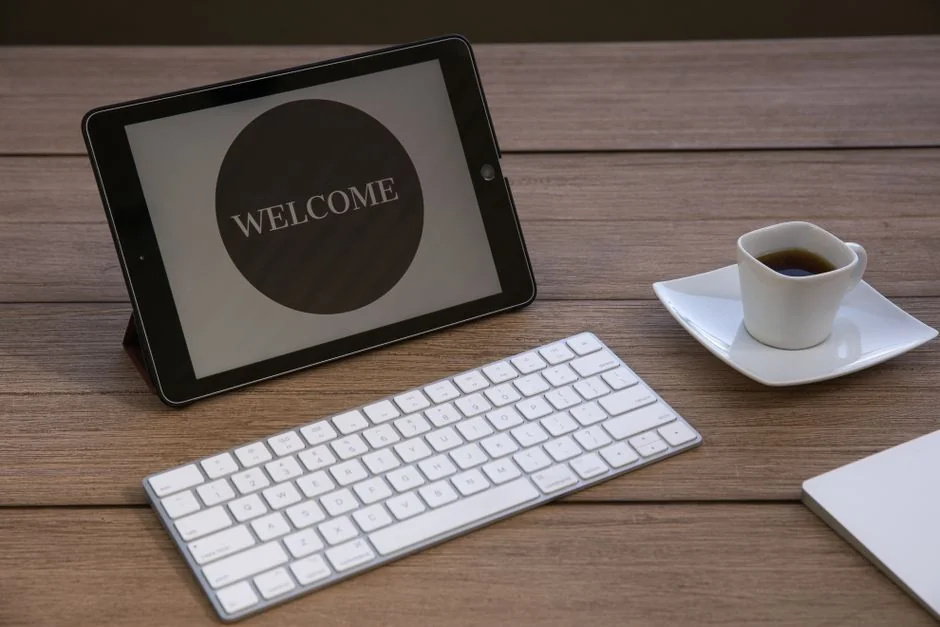 A contemporary computer display showing web design projects, with creative visuals arranged in a workspace.